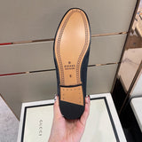 Side profile of Gucci tonal black sneakers bold athletic profile