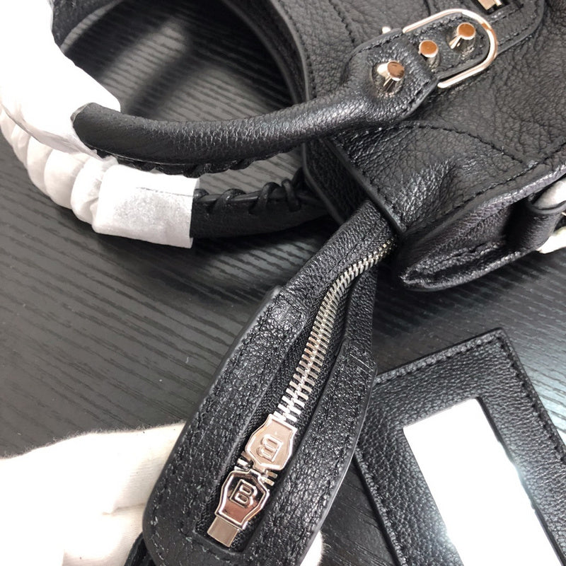 Styled lifestyle shot of elevated polished women's handbag – women's luxury accessory