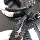 Styled lifestyle shot of elevated polished women's handbag – women's luxury accessory