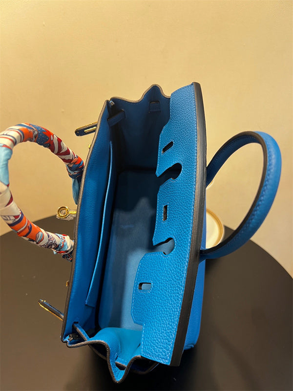 Side view of modernist structured handbag