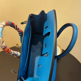 Side view of modernist structured handbag