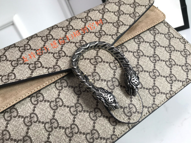 Handle and strap detail of signature classic women's handbag – women's statement bag