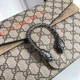 Handle and strap detail of signature classic women's handbag – women's statement bag