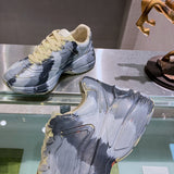 Gucci soft grey luxury sneakers view 10 bold athletic profile