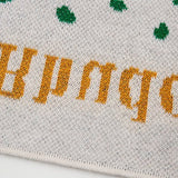 Close-up detail shot of Rhude luxury clothing with tailored silhouette
