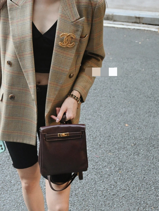 Side view of polished structured handbag