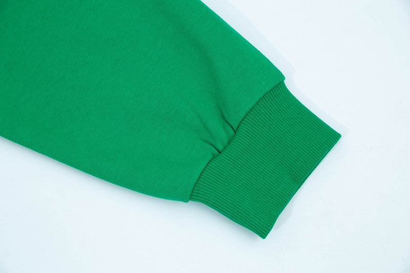 Flat lay presentation of Gucci luxury clothing with relaxed-fit cut