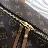 Top view of modern signature women's handbag – women's designer-style accessory