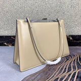 Close-up detail of sleek modern women's handbag – women's luxury accessory