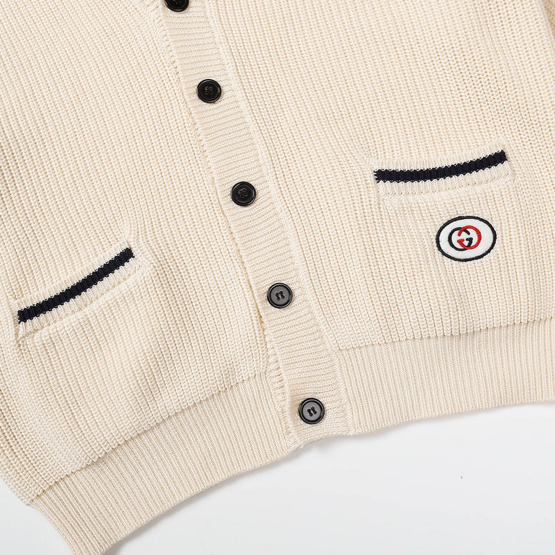 Flat lay presentation of Gucci luxury clothing with logo-detail design