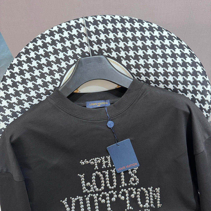 Close-up detail shot of Louis Vuitton cotton t-shirt with monogram-inspired silhouette