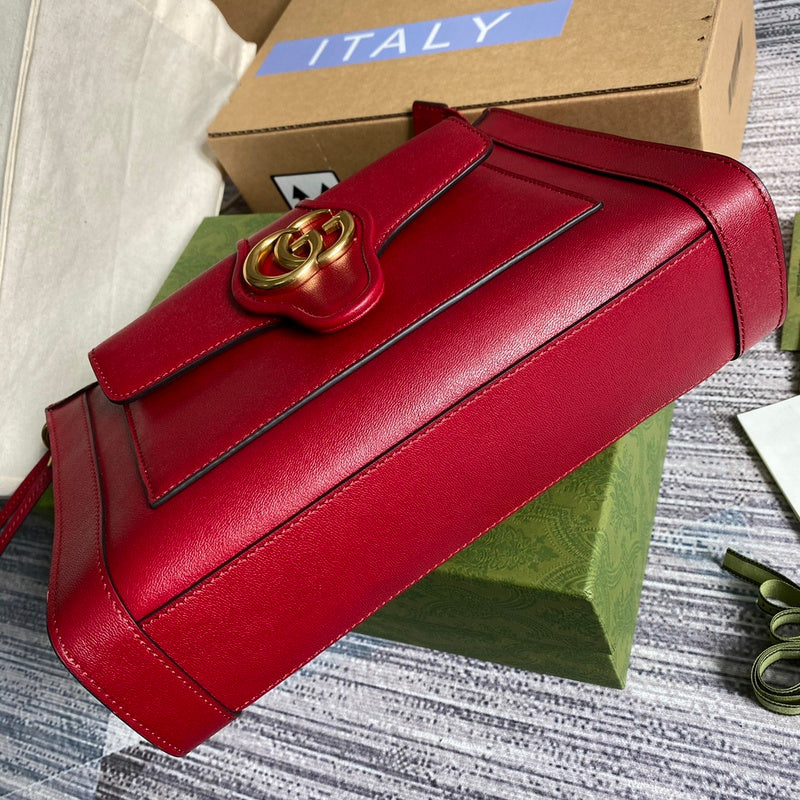 Handle and strap detail of refined statement women's handbag – women's statement bag
