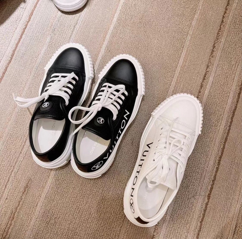 Louis Vuitton Black High-Top Sneakers - Front View