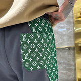 Close-up detail shot of Louis Vuitton luxury clothing with everyday silhouette