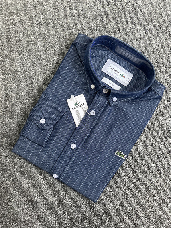 Side profile of Lacoste luxury clothing with monogram-inspired silhouette