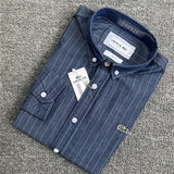 Side profile of Lacoste luxury clothing with monogram-inspired silhouette