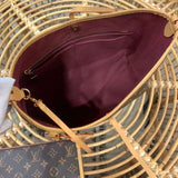 Side profile of statement classic women's handbag – women's luxury accessory