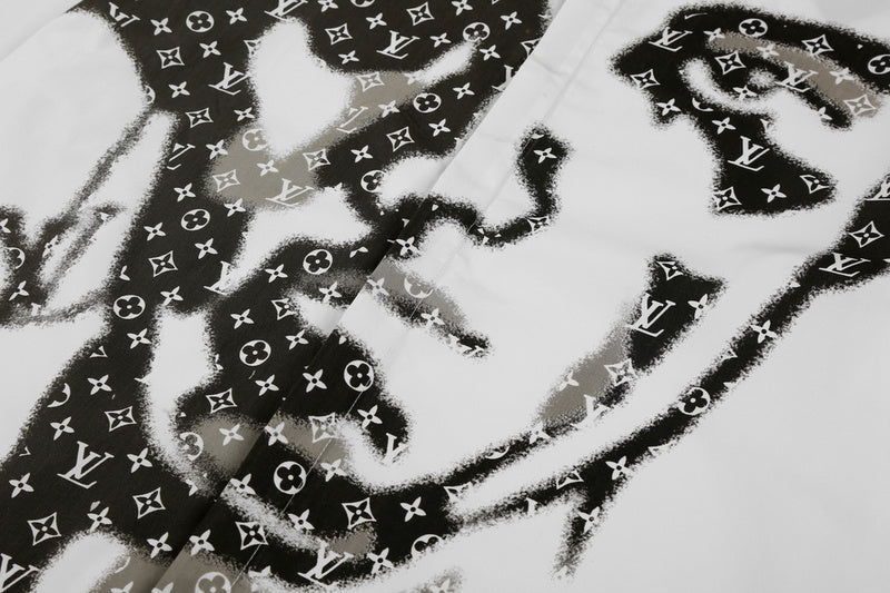 Close-up detail shot of Louis Vuitton luxury clothing with logo-detail design