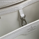  polished crossbody bag detail view showing craftsmanship 50