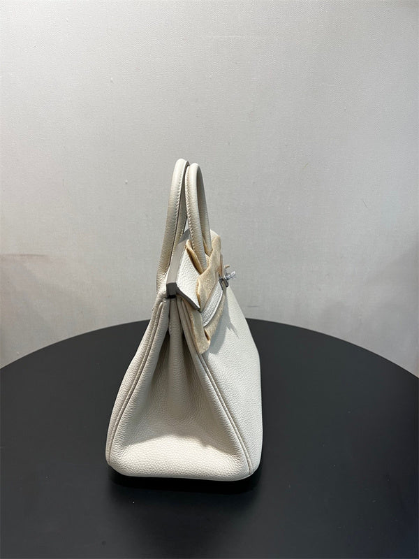  Understated handbag front view 7