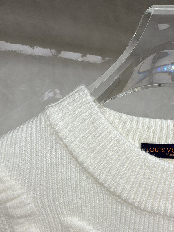 Close-up detail shot of Louis Vuitton luxury clothing with relaxed-fit cut
