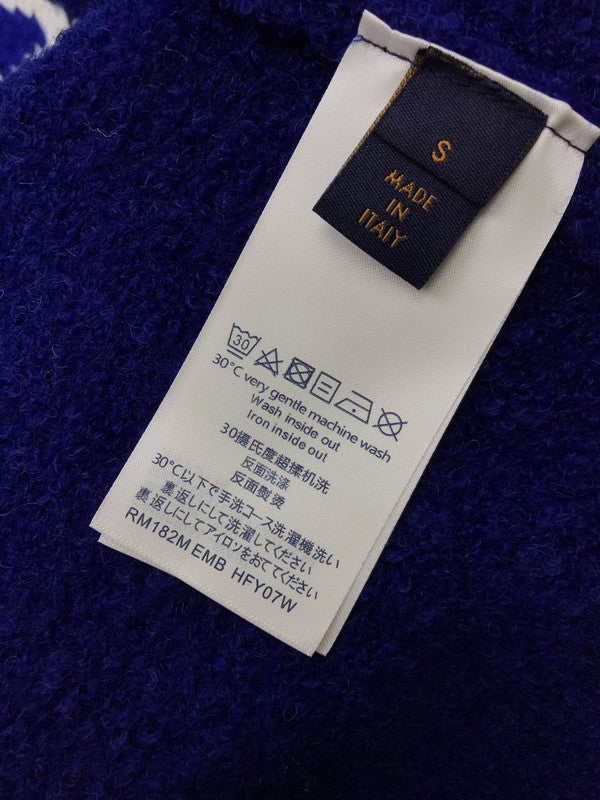 Close-up detail shot of Louis Vuitton luxury clothing with contemporary cut