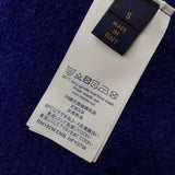 Close-up detail shot of Louis Vuitton luxury clothing with contemporary cut