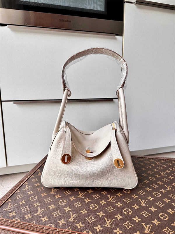 graceful top-handle bag detail view showing craftsmanship 20