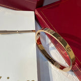Front view of Cartier unisex jewelry piece