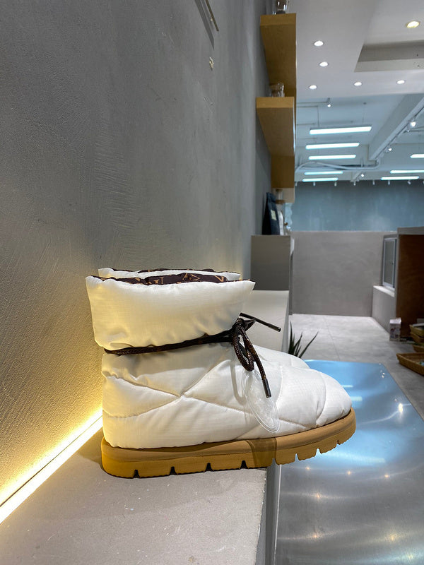 Louis Vuitton White Low-Top Sneakers - Close-Up Texture View