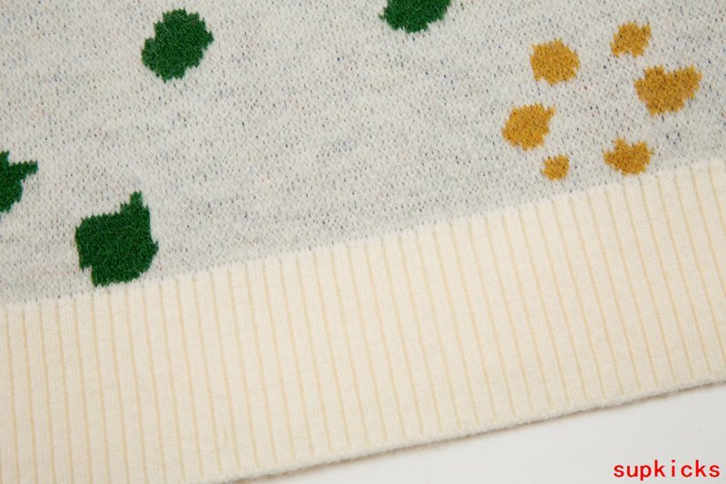 Close-up detail shot of Rhude luxury clothing with monogram-inspired silhouette