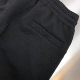 Back view of Louis Vuitton luxury clothing with signature branding