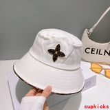 Close-up detail view of Louis Vuitton unisex cap