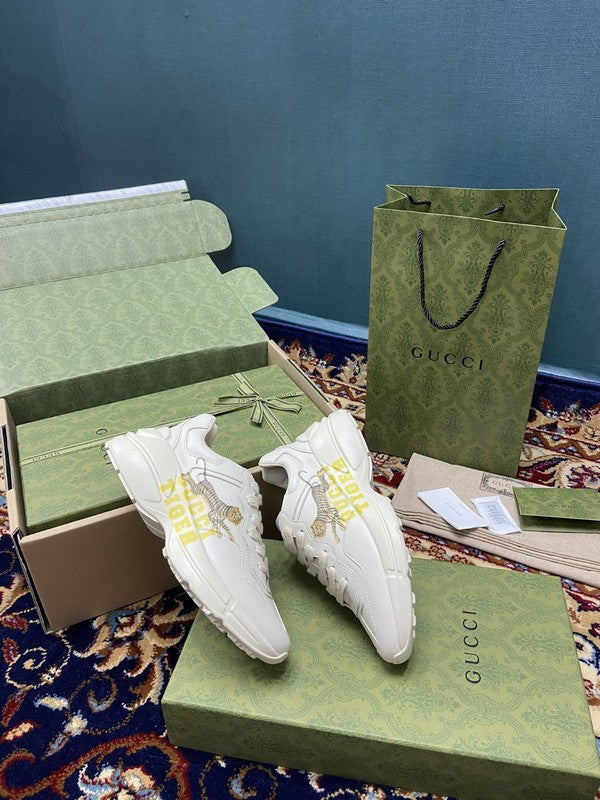 Side profile of Gucci clean off-white sneakers premium leather build