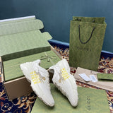 Side profile of Gucci clean off-white sneakers premium leather build