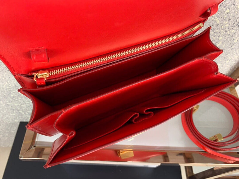 Side profile of signature classic women's handbag – women's designer-style accessory