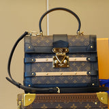 Side profile of classic modern women's handbag – women's luxury accessory