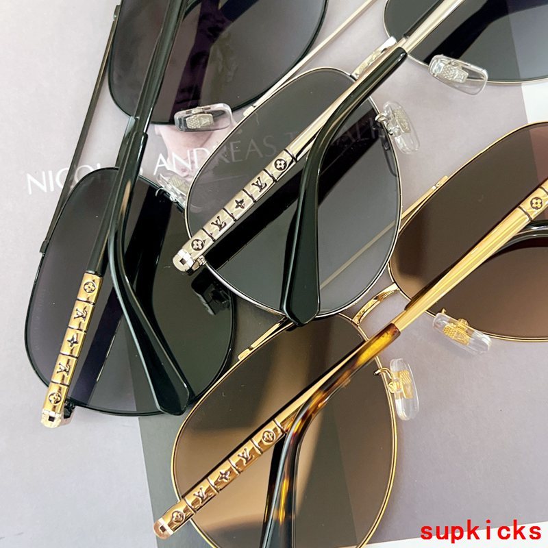 Close-up detail view of Louis Vuitton unisex sunglasses