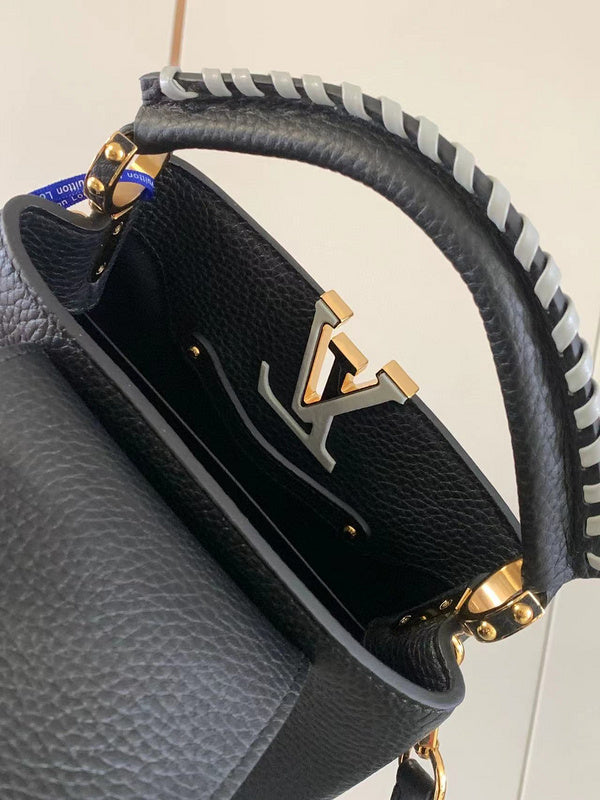 Front view of polished structured women's handbag – women's luxury accessory
