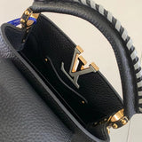 Front view of polished structured women's handbag – women's luxury accessory