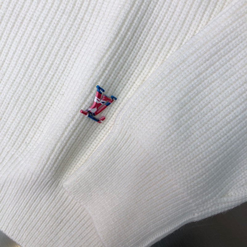 Close-up detail shot of Louis Vuitton luxury clothing with monogram-inspired silhouette
