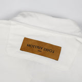 Close-up detail shot of Louis Vuitton luxury clothing with monogram-inspired silhouette