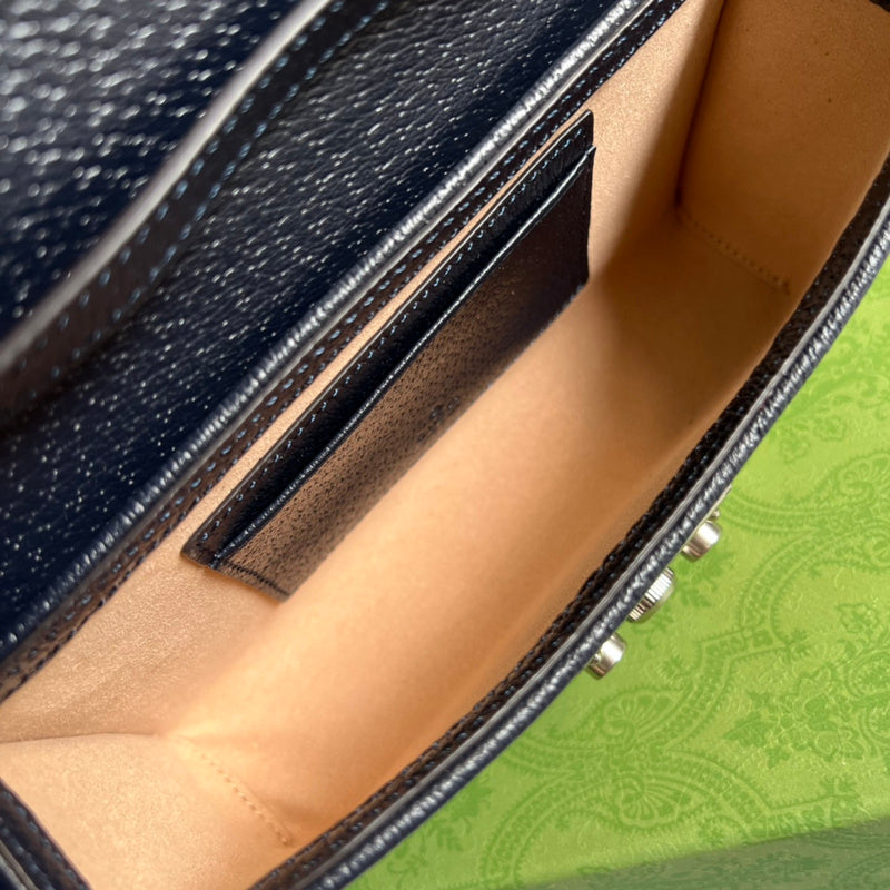 Side profile of modern premium women's handbag – women's luxury accessory