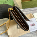 Handle and strap detail of polished signature women's handbag – women's statement bag