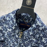 Close-up detail shot of Louis Vuitton luxury clothing with runway-inspired design