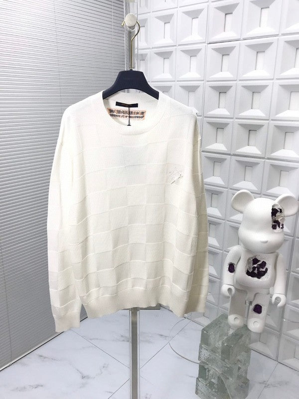 Side profile of Louis Vuitton luxury clothing with signature branding