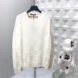 Side profile of Louis Vuitton luxury clothing with signature branding