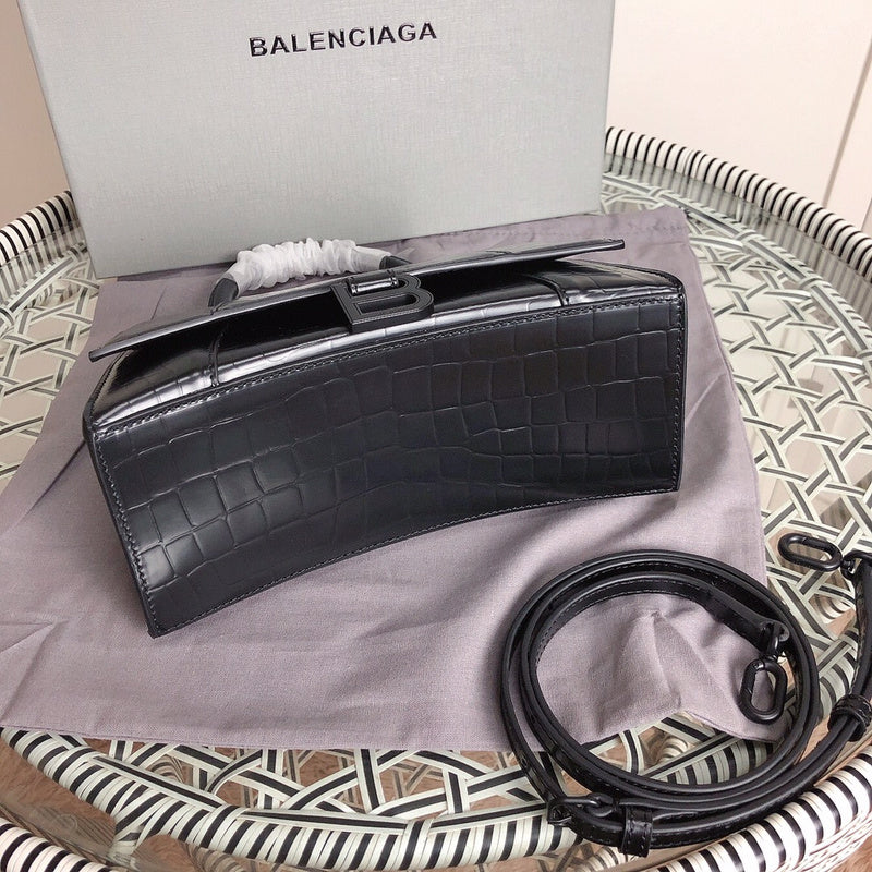 Back view of polished chic women's handbag – women's statement bag