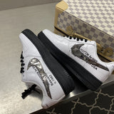Nike all-black luxury sneakers view 5 retro runner design