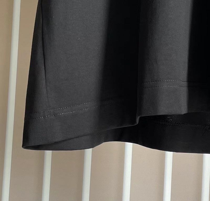 Side profile of Givenchy luxury clothing with logo-detail design